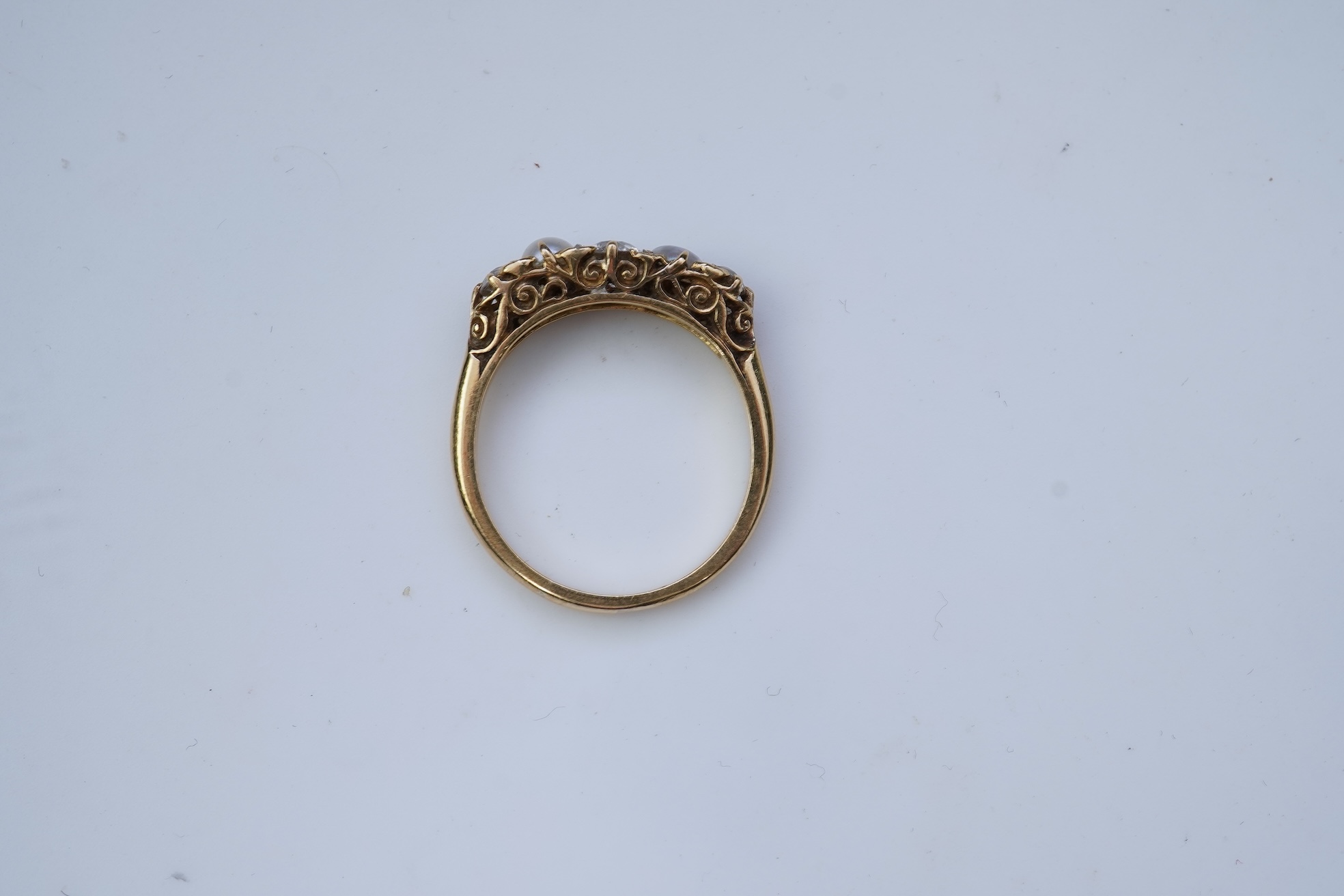 A five-stone pearl and diamond ring, early 20th century